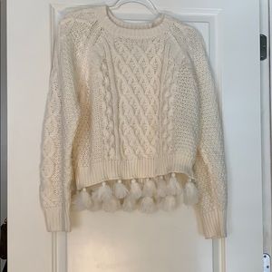 Hem & Thread cream sweater with tassels.